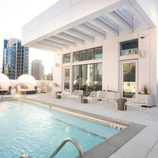 Luxurious rooftop pool in a modern urban setting.