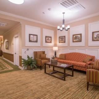 A cozy lobby area with comfortable seating and elegant decor.