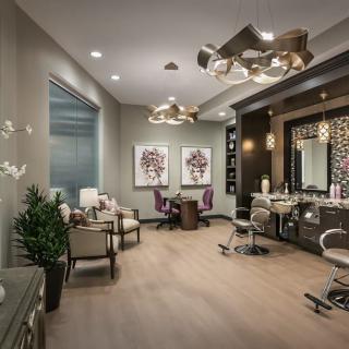 A modern and stylish salon interior with elegant decor and lighting.