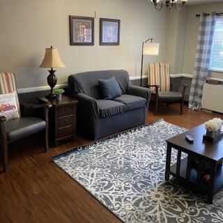 A cozy and inviting living room filled with comfortable furniture and stylish decor.