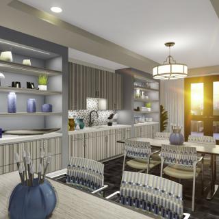 A modern kitchen and dining area with stylish decor and lighting.