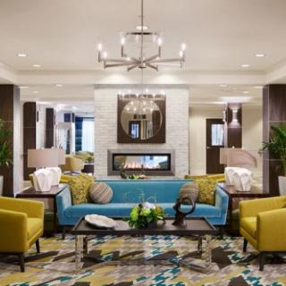 A luxurious living room with stylish furniture and elegant decor.