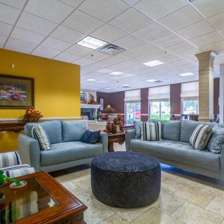 A modern lobby with comfortable seating and stylish decor.