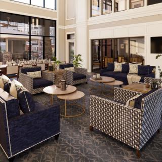 A modern, well-designed lobby with comfortable seating and stylish decor.