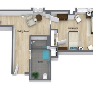 A modern apartment floor plan featuring a living room, bedroom, and bathroom.