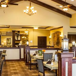 Elegantly designed restaurant interior with cozy seating and warm lighting.