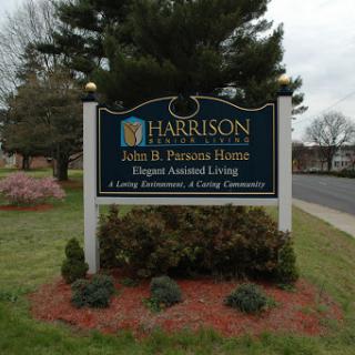 Entrance sign for Harrison Assisted Living Facility