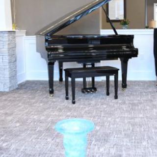 A grand piano in a room with modern decor.