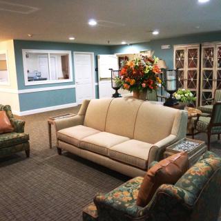A cozy lobby area with comfortable seating and elegant decor.