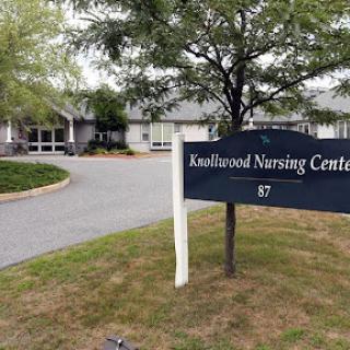 Exterior view of Eastwood Nursing Center, showcasing the facility's entrance and signage.