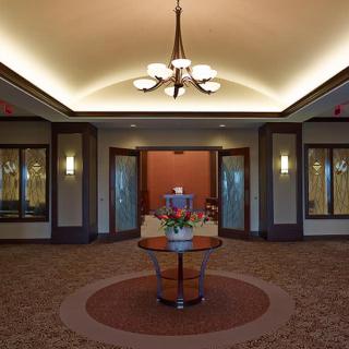 A modern lobby with elegant lighting and decor.