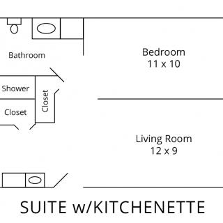 Floor plan of a suite with kitchenette, including bedroom, living room, and bathroom.