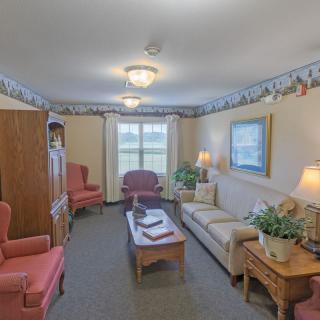 A cozy living room with classic furniture and decor.