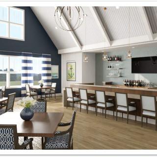 A modern bar and restaurant interior with ample seating, featuring contemporary chandeliers and wood flooring.