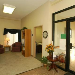 A cozy waiting room with comfortable chairs and a welcoming atmosphere.