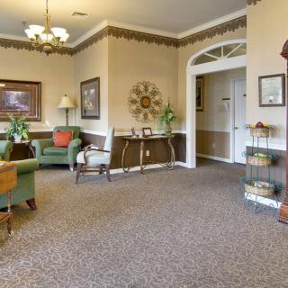A cozy living room with elegant furniture and tasteful decor.