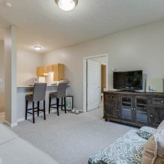 Open-concept apartment with a living room and kitchen area.