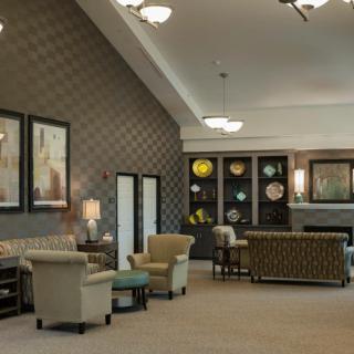 A modern lounge with comfortable seating and stylish decor.