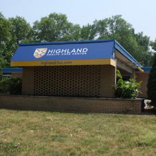 Highland Educational Facility with a sunny outdoor setting.