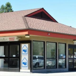 A small fast-food restaurant with a drive-thru window.