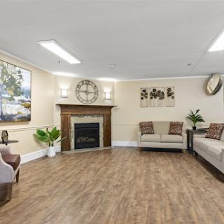 A stylish and cozy living room featuring a fireplace, comfortable sofas, and tasteful decor.