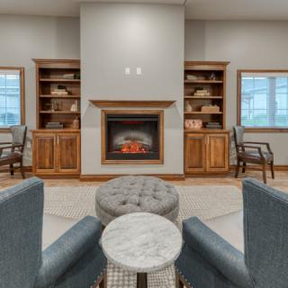 Cozy living room with a fireplace and comfortable seating.