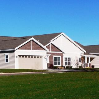 A suburban residential house on a clear day.
