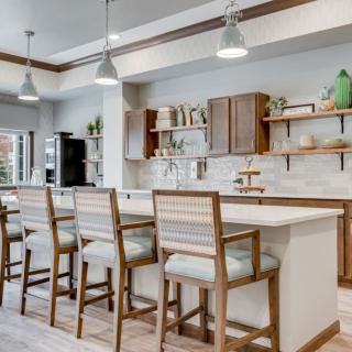 Modern kitchen with a spacious island and stylish pendant lighting.