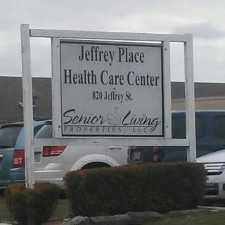 Sign for Jeffrey Place Health Care Center, emphasizing senior living services.
