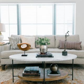 A modern living room with a comfortable sofa and stylish coffee table.