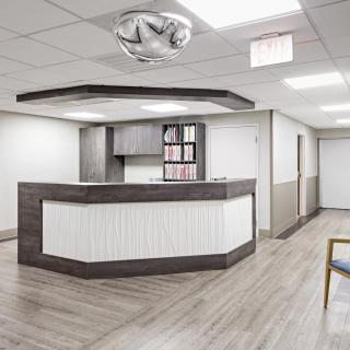 Modern reception area with sleek furniture and minimalist design.