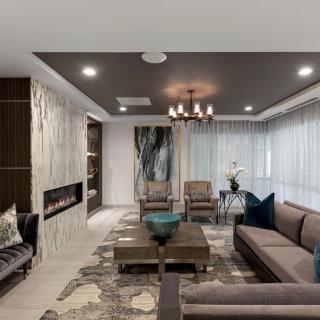 A modern living room with stylish furniture and elegant decor.