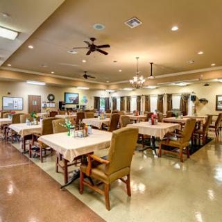 A spacious dining area designed for comfort and social interactions.