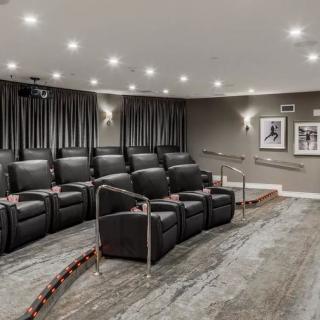 A luxurious home theater with comfortable seating and elegant design.