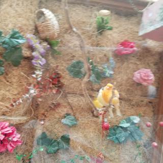 A vibrant display of artificial flowers and decorative elements, creating a cheerful ambiance.