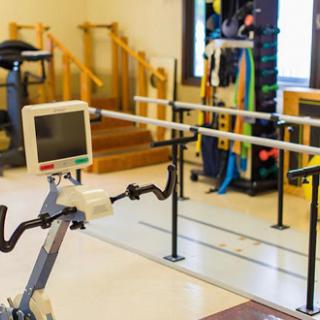 A physical therapy room equipped with specialized exercise tools for rehabilitation.