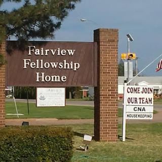 Entrance to Fairview Fellowship Home with a recruitment sign for CNA positions.