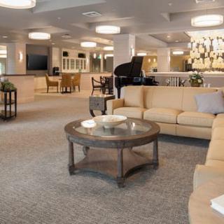 A spacious and modern lobby area with comfortable seating and elegant decor.