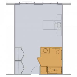 A floor plan with a bathroom layout and open room space.