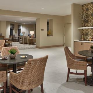 A modern lounge area featuring comfortable seating and stylish decor.