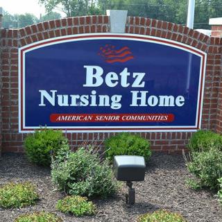 A sign for Betz Nursing Home, indicating the location of a senior care facility.