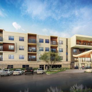 A modern multistory residential building showcasing contemporary architecture.