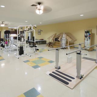 A well-equipped gym space designed for fitness and rehabilitation.