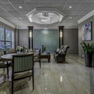A modern lobby with elegant seating and stylish decor.