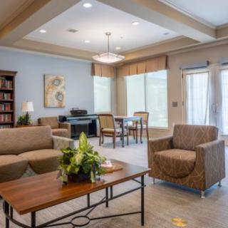 A modern living room with comfortable seating and stylish decor.