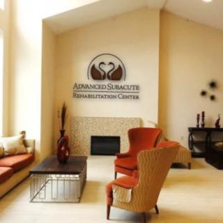 A modern living room interior with stylish furniture and a warm color palette.