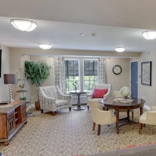 A cozy living room with comfortable seating and natural light.