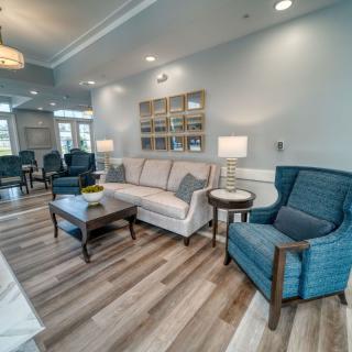 A modern living room with comfortable seating and stylish decor.