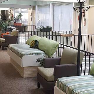 A cozy indoor lounge area featuring comfortable seating and stylish decor.