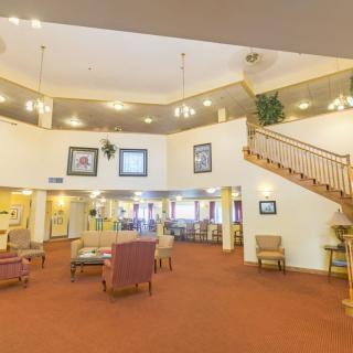 Spacious lobby with comfortable seating and elegant lighting.